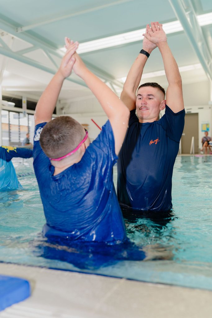 Participants building water confidence at an inclusive lesson
