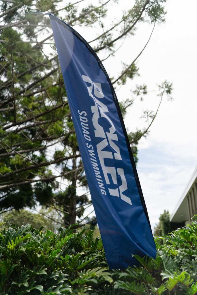 Rackley Swimming branded flag at an inclusive swim session